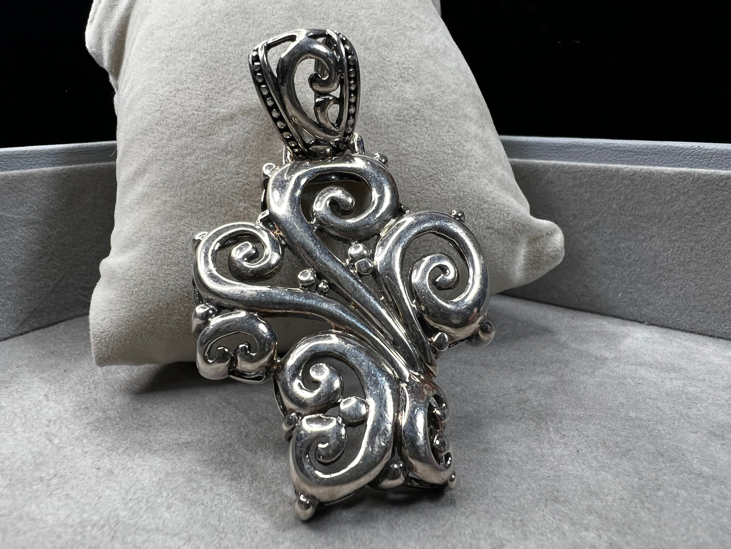 This large 2.5" sterling silver crucifix pendant combines boldness with elegance in its detailed craftsmanship. Its striking design makes it a meaningful statement piece, perfect for expressing faith with style and confidence.