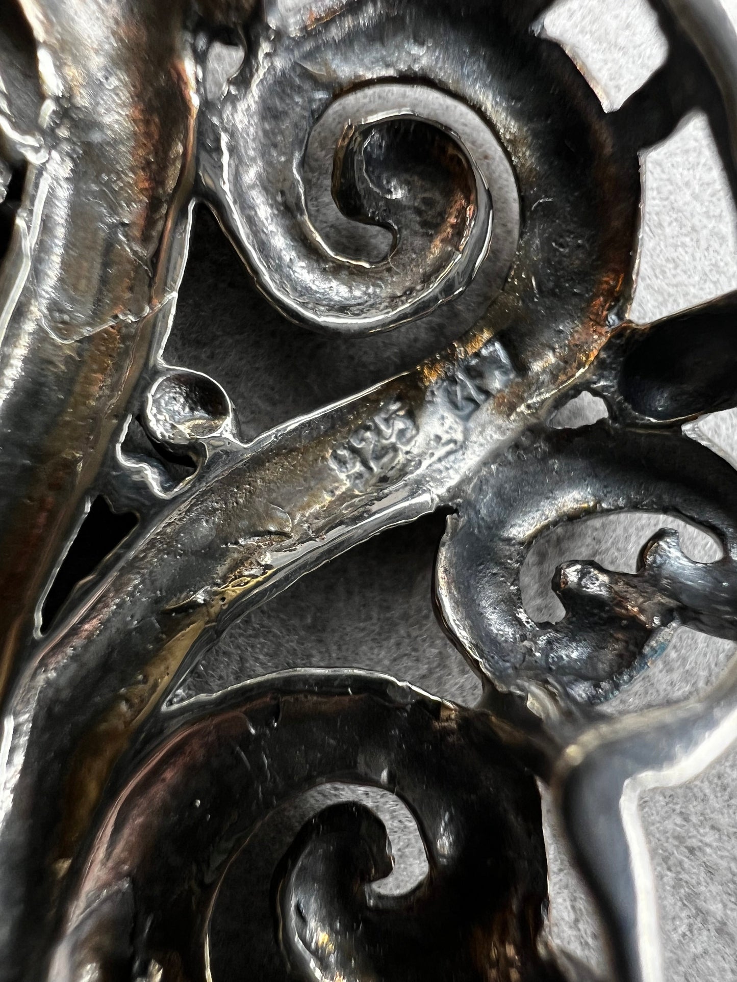 This large 2.5" sterling silver crucifix pendant combines boldness with elegance in its detailed craftsmanship. Its striking design makes it a meaningful statement piece, perfect for expressing faith with style and confidence.