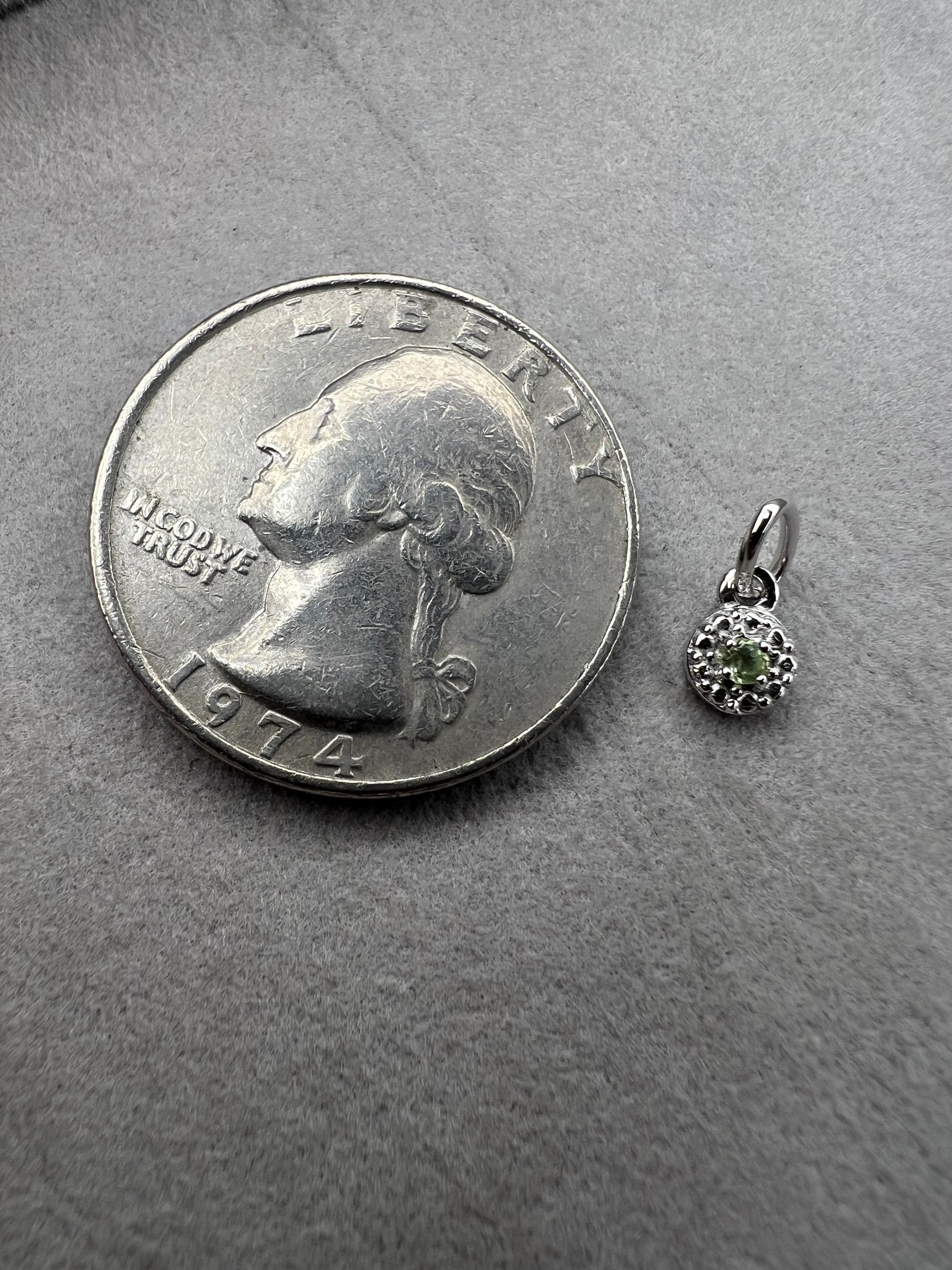 From Lenox, this little pendant is ready to be paired with a small chain or used as a charm.