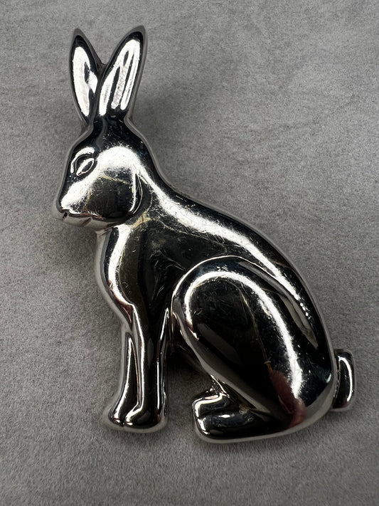 This sterling silver rabbit offers versatile wear as either a pendant or a brooch. Its charming design makes it a delightful addition to any collection, perfect for adding a touch of whimsy and elegance to your style.