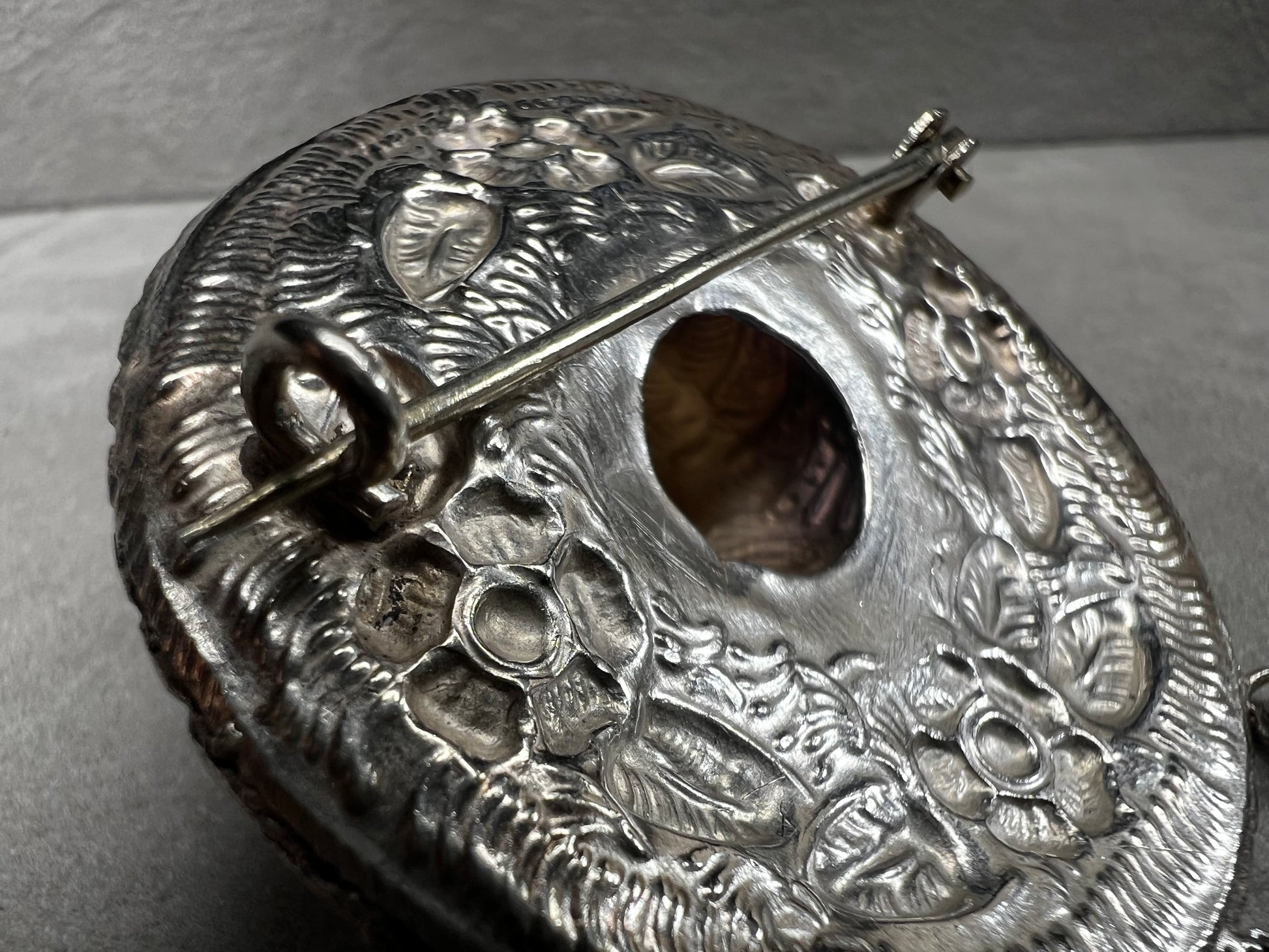 This charming 1950s sterling silver brooch captures a playful scene with a large sombrero, a pair of sandals, and a maraca. Its unique design reflects vintage character and cultural flair, making it a delightful accessory that adds personality and nostalgia to your collection.