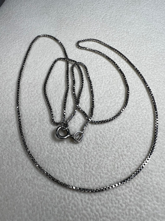 This vintage 19" Italian sterling silver box chain offers timeless elegance that you can wear alone or layer effortlessly with other necklaces. Its sturdy design makes it the perfect match for showcasing your favorite pendant, adding a touch of classic style to any look.