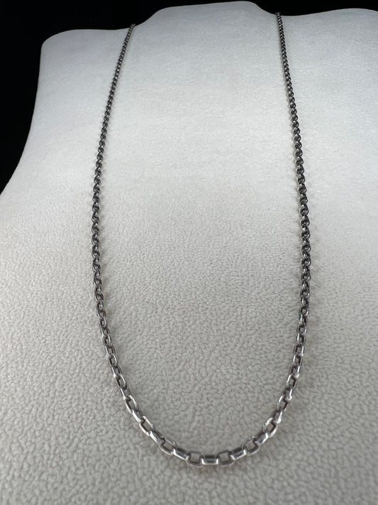 This vintage 26" sterling silver cable chain offers a strong, durable design that stands out beautifully on its own or complements any pendant with ease. Its classic style and reliable construction would make it a versatile addition to your jewelry collection.