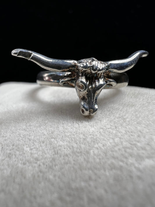 Add a little wild spirit to your style with this sterling silver ring featuring a charming longhorn bull head. Playful yet perfectly detailed, it’s the perfect way to show off your bold side with a touch of fun flair.