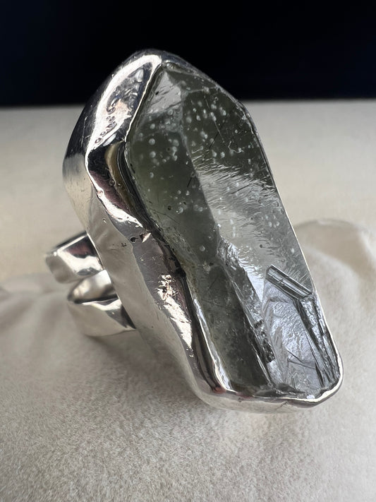 This Loving Anvil ring combines fine sterling silver with a stunning large Herkimer diamond, carefully designed to shine with natural brilliance. The double band adds extra strength, ensuring the ring remains comfortable and secure.
