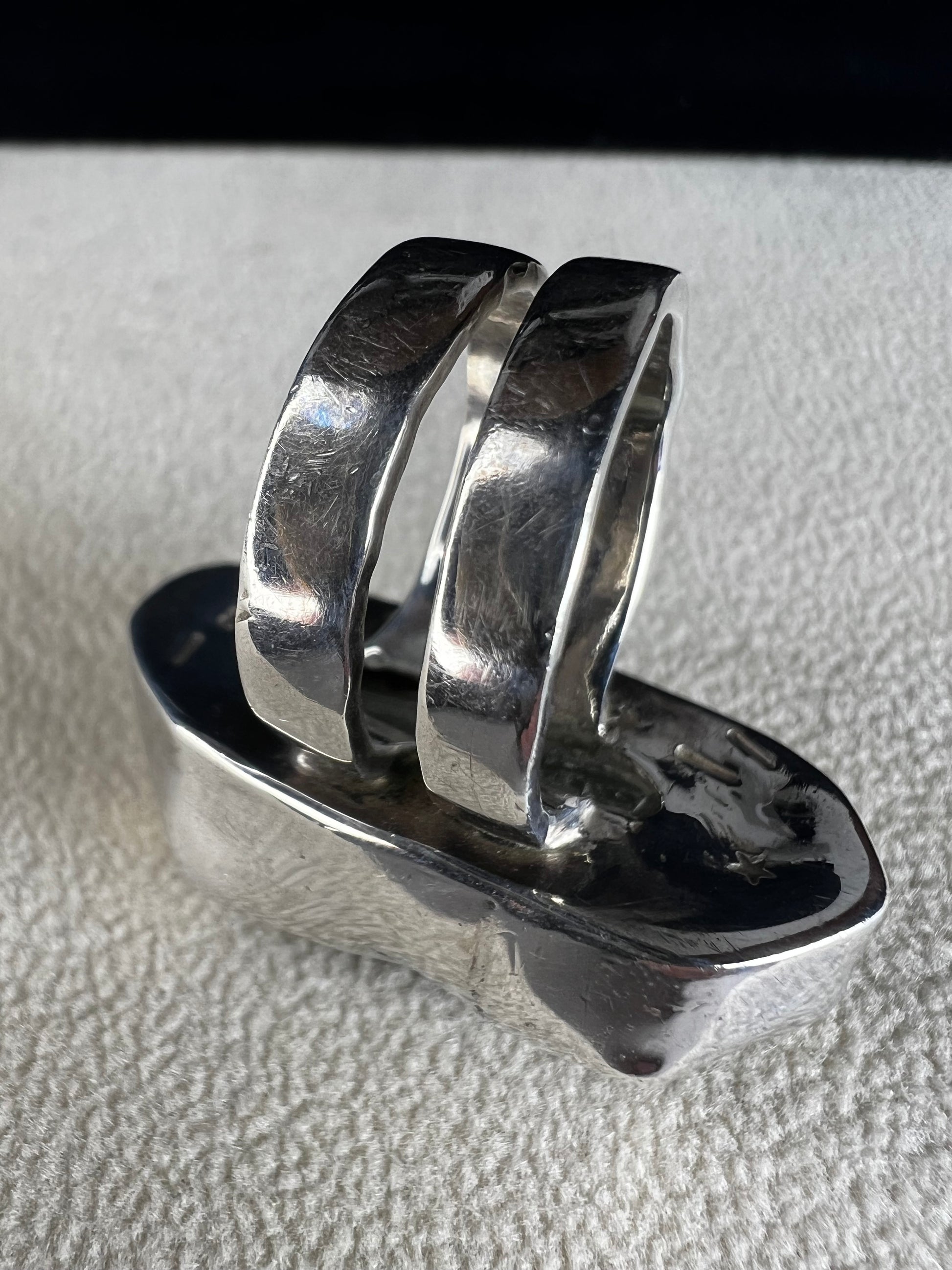 This Loving Anvil ring combines fine sterling silver with a stunning large Herkimer diamond, carefully designed to shine with natural brilliance. The double band adds extra strength, ensuring the ring remains comfortable and secure.