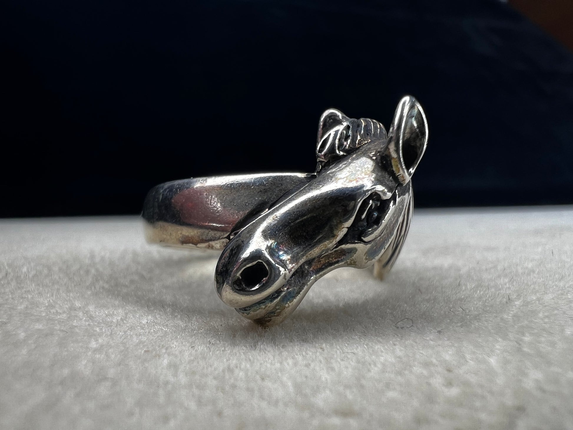 Expertly crafted from sterling silver, this ring showcases a meticulously detailed horse head, capturing the essence of equine beauty with precision. Perfect for anyone who has a love for horses.
