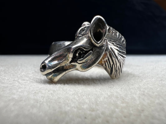 Expertly crafted from sterling silver, this ring showcases a meticulously detailed horse head, capturing the essence of equine beauty with precision. Perfect for anyone who has a love for horses.