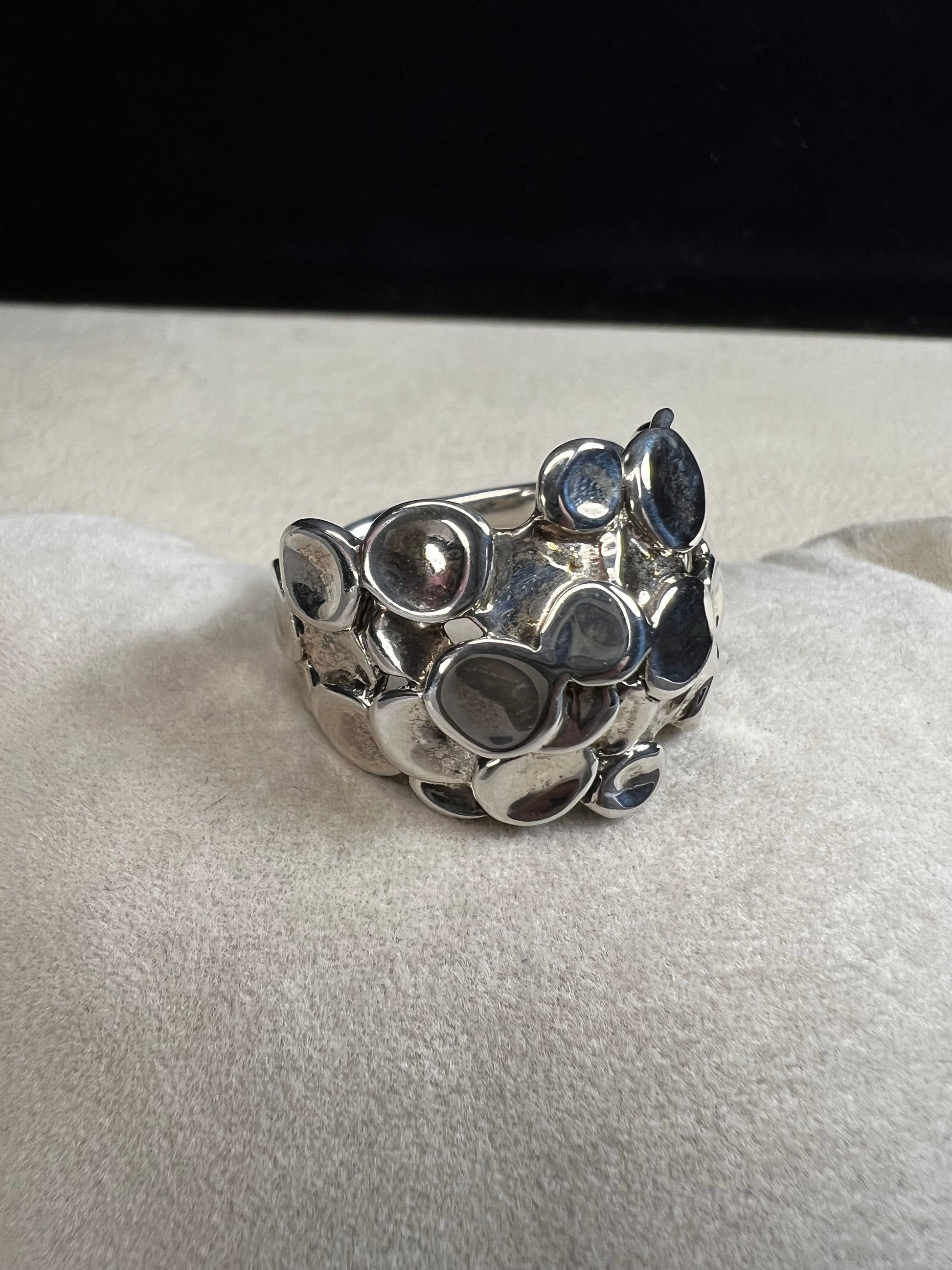 This sterling silver ring by Israeli designer Hagit Gorali is expertly crafted to reflect light beautifully, enhancing your style with a radiant and elegant glow.