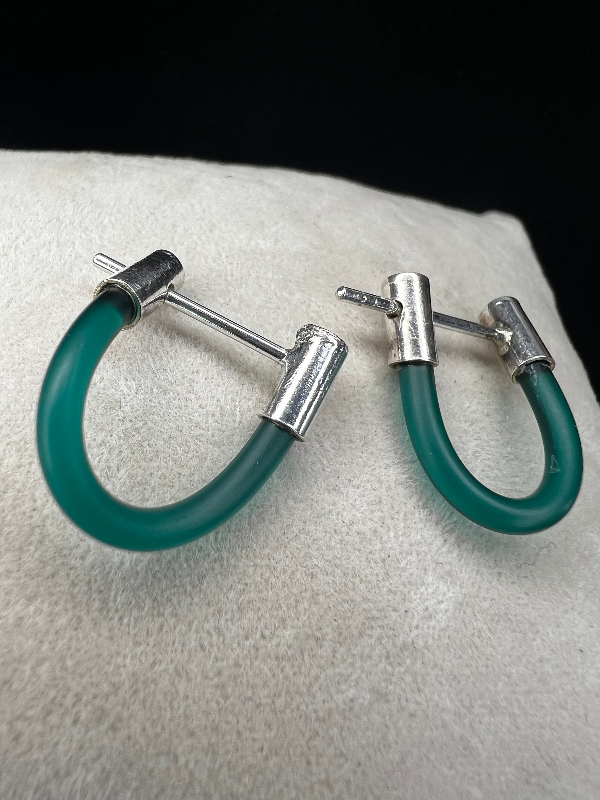 Complement your outfit with these unique earrings. They will add a nice pop of color.