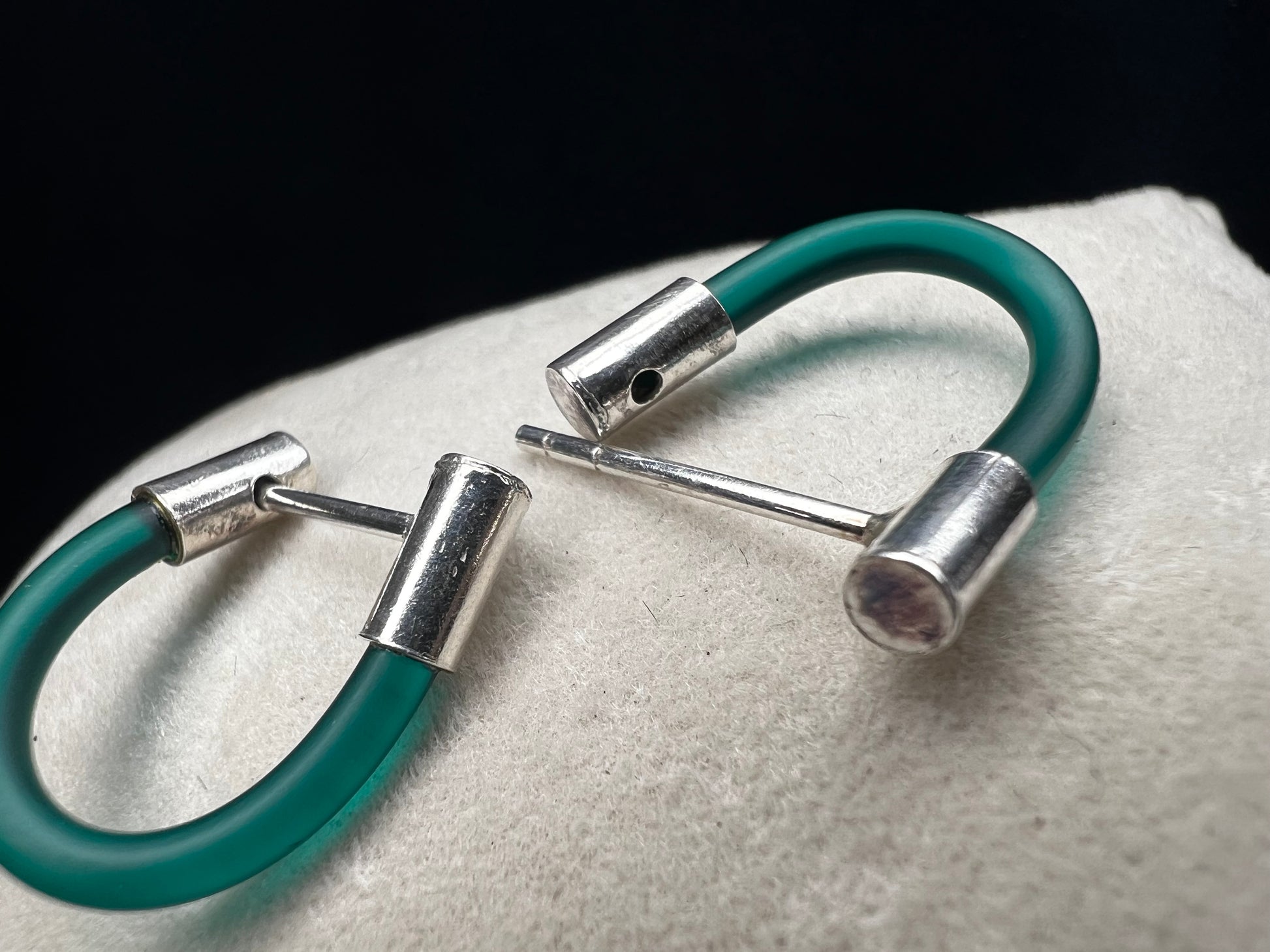 Complement your outfit with these unique earrings. They will add a nice pop of color.