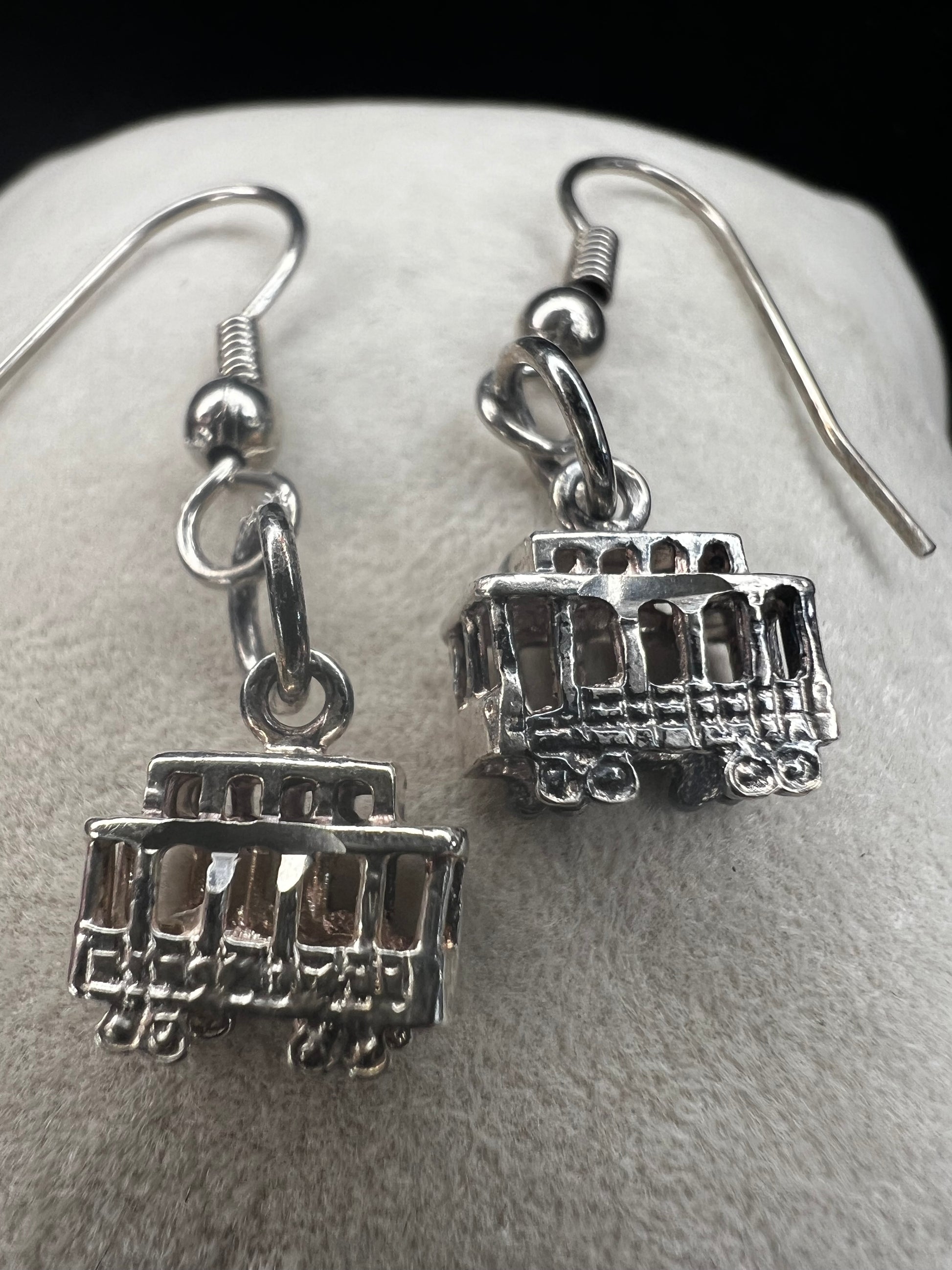 Made from sterling silver, these trolley earrings would be a cute addition to any outfit.