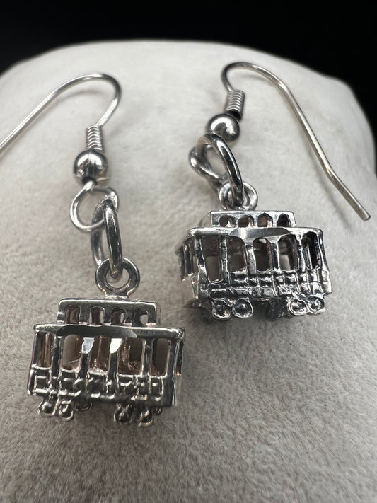 Made from sterling silver, these trolley earrings would be a cute addition to any outfit.