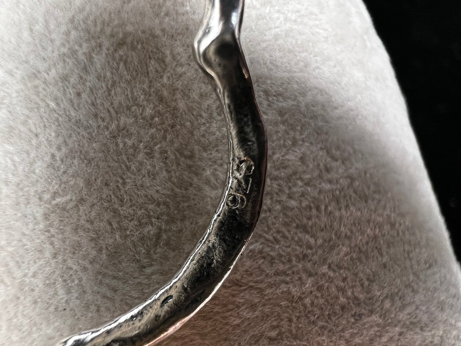 These hammered and scalloped sterling silver earrings will add a bit of flash to your outfit.