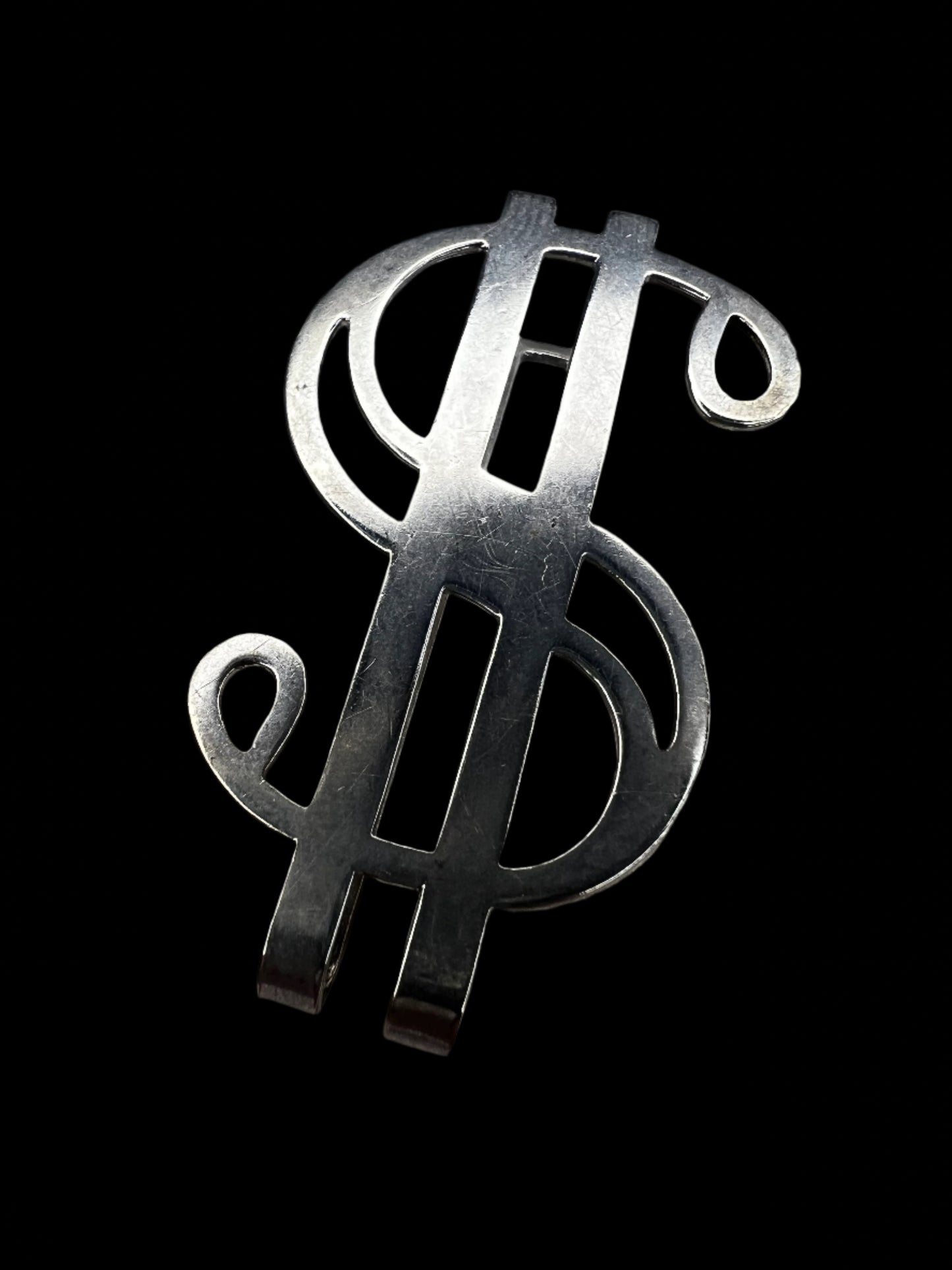 This vintage piece is crafted from sterling silver and designed to hold folded cash. If you're looking for a unique gift, this fits the bill.