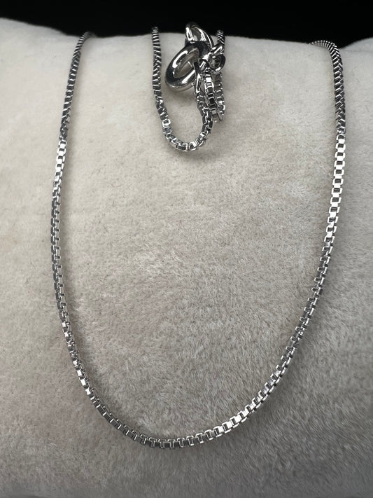 Indulge in elegance with our dainty sterling silver chain. Wear it alone or pair it with a pendant for maximum impact. Or, you can layer it with other necklaces. Made in Italy.