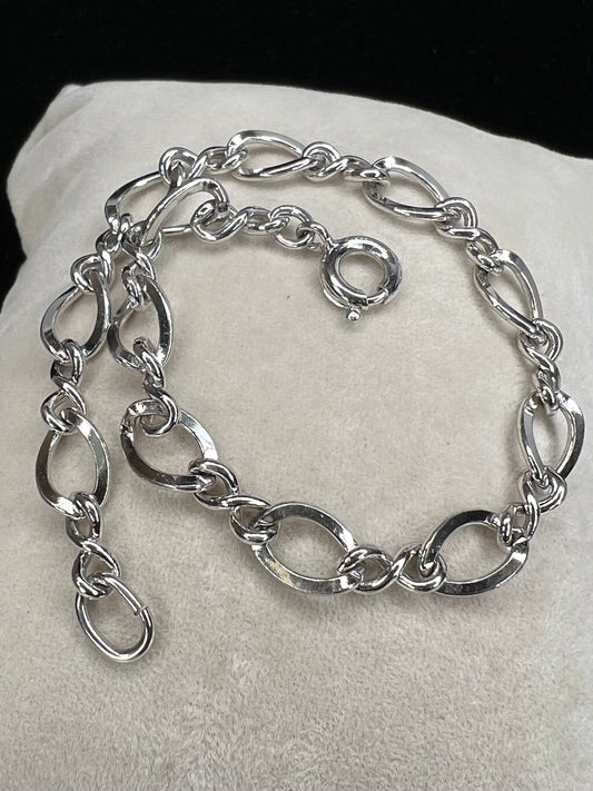 Complement your outfit with this sterling silver bracelet. It features a nice link for a different look.