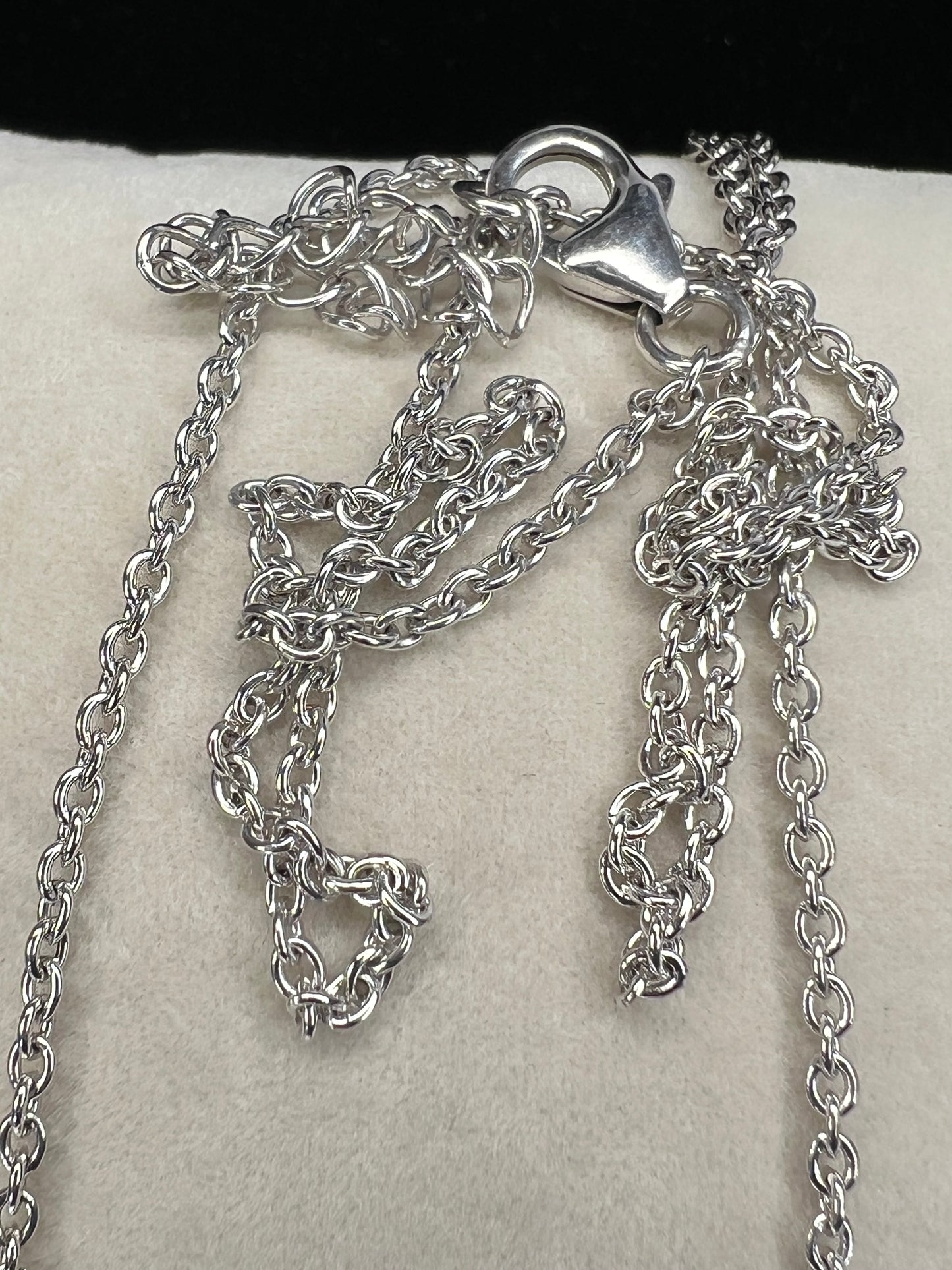 Add a subtle touch of sophistication with this petite sterling silver chain necklace. It features a classic cable link and is perfect either on its own or paired with a pendant.