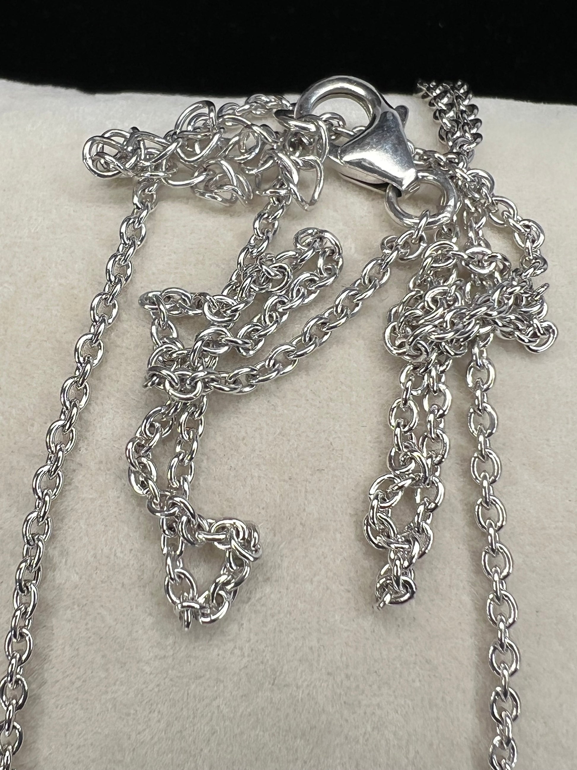 Add a subtle touch of sophistication with this petite sterling silver chain necklace. It features a classic cable link and is perfect either on its own or paired with a pendant.