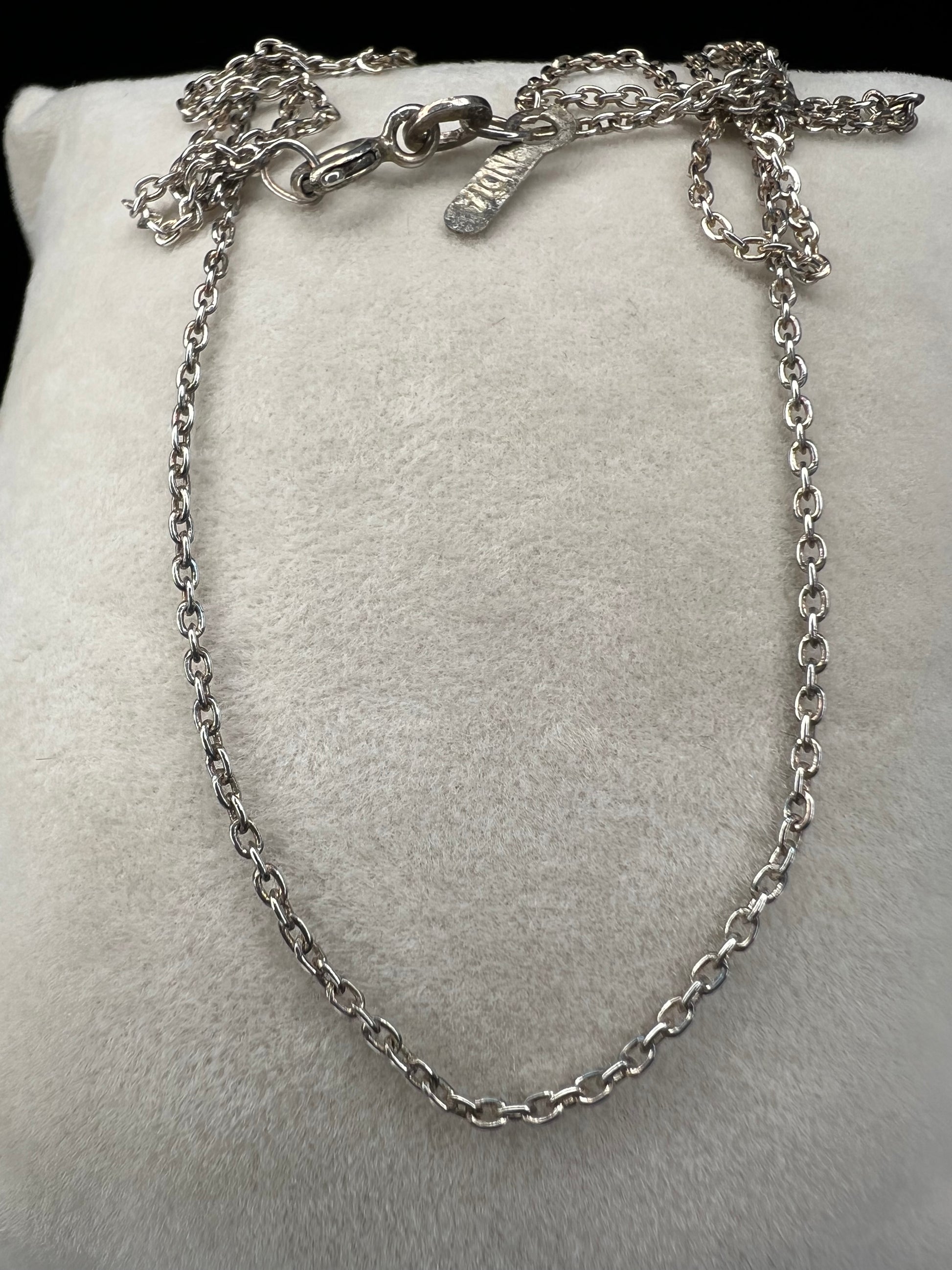Add a touch of elegance with our 20" petite sterling silver chain, handcrafted in India. This vintage cable chain is the perfect addition to any outfit, adding a delicate and timeless touch.
