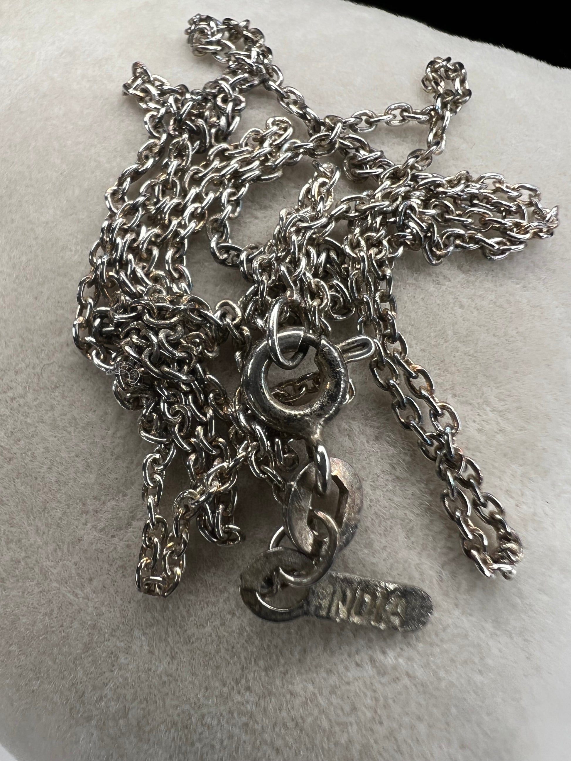 Add a touch of elegance with our 20" petite sterling silver chain, handcrafted in India. This vintage cable chain is the perfect addition to any outfit, adding a delicate and timeless touch.