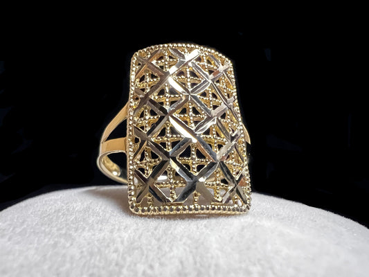 This beautiful 14 karat gold ring features a lattice pattern design, expertly cut to reflect light. It will add a touch of elegance to any look.