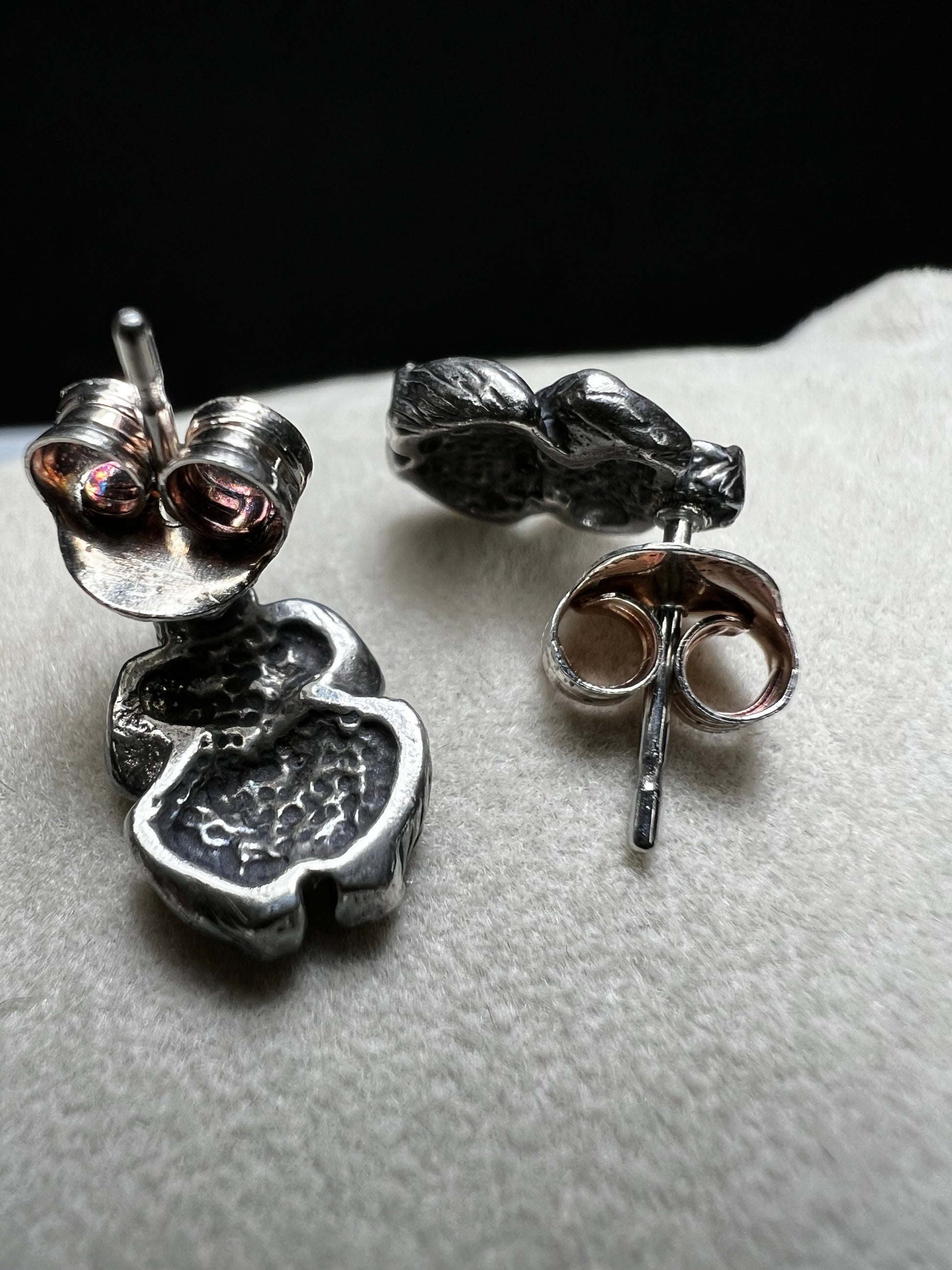 Crafted from sterling silver, these gorilla stud earrings combine playful charm with expert craftsmanship. Their compact size makes them perfect for everyday wear, adding a subtle yet distinctive touch to any outfit.