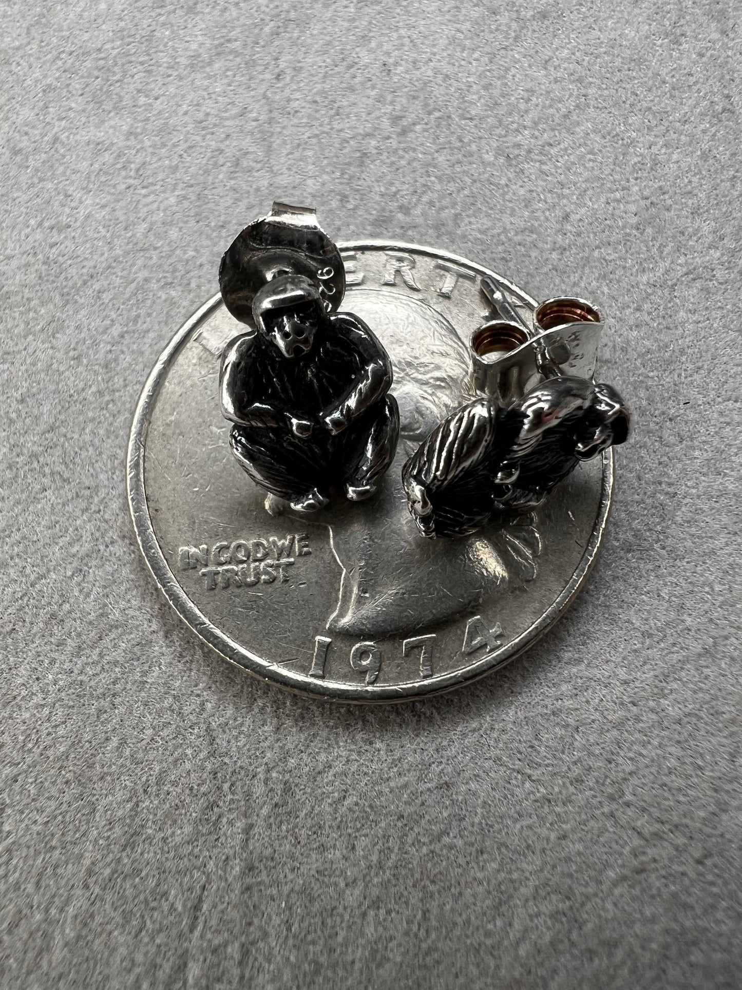 Crafted from sterling silver, these gorilla stud earrings combine playful charm with expert craftsmanship. Their compact size makes them perfect for everyday wear, adding a subtle yet distinctive touch to any outfit.
