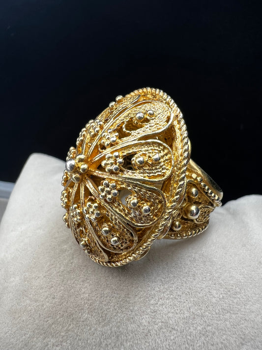 This remarkable antique ring, expertly made in Israel from sterling silver and finished with a gold wash, showcases exquisite early craftsmanship that is genuinely impressive.