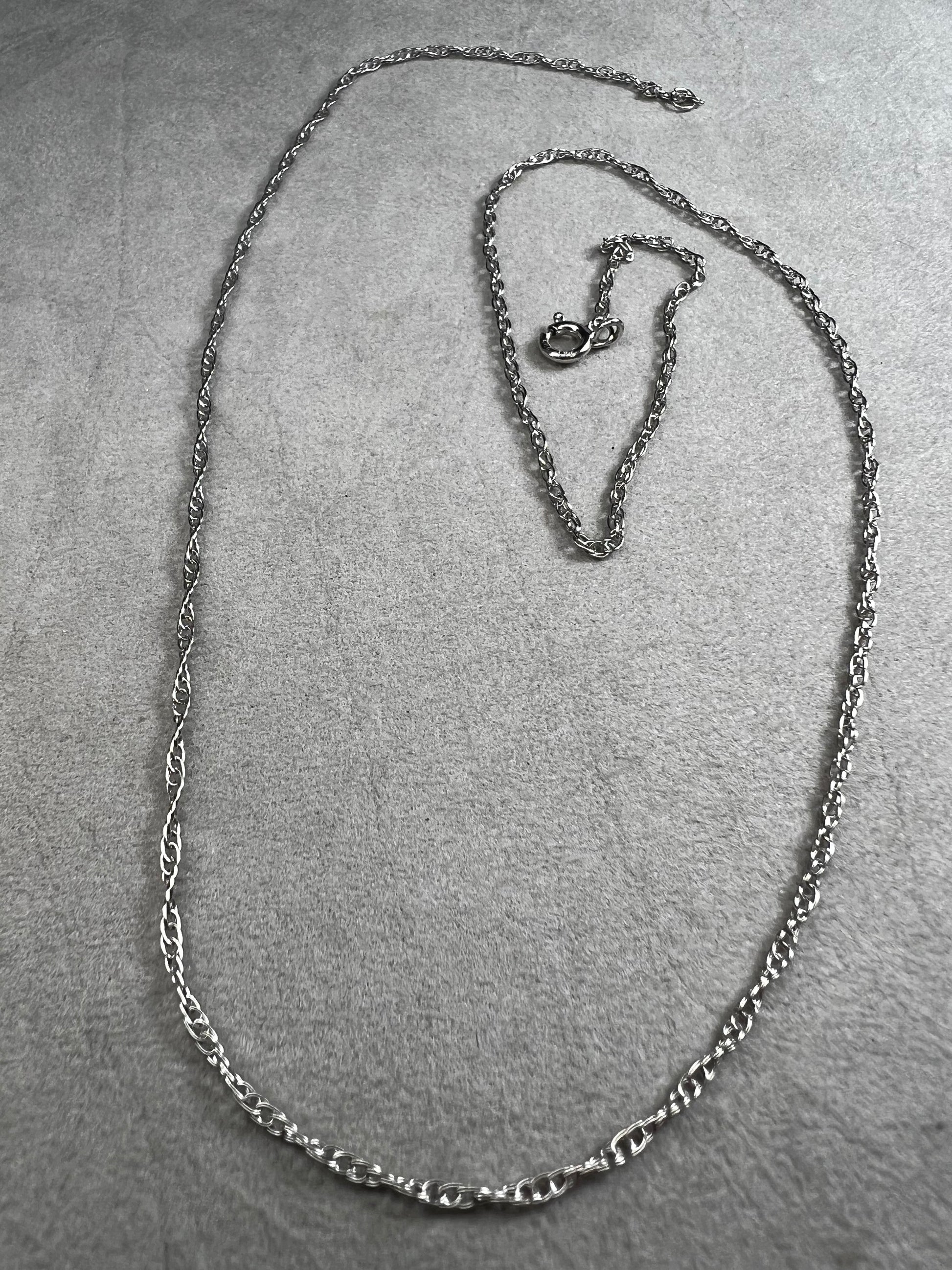 This 18" sterling silver chain offers a refined foundation for your favorite small pendants. It is perfectly balanced to complement delicate designs.