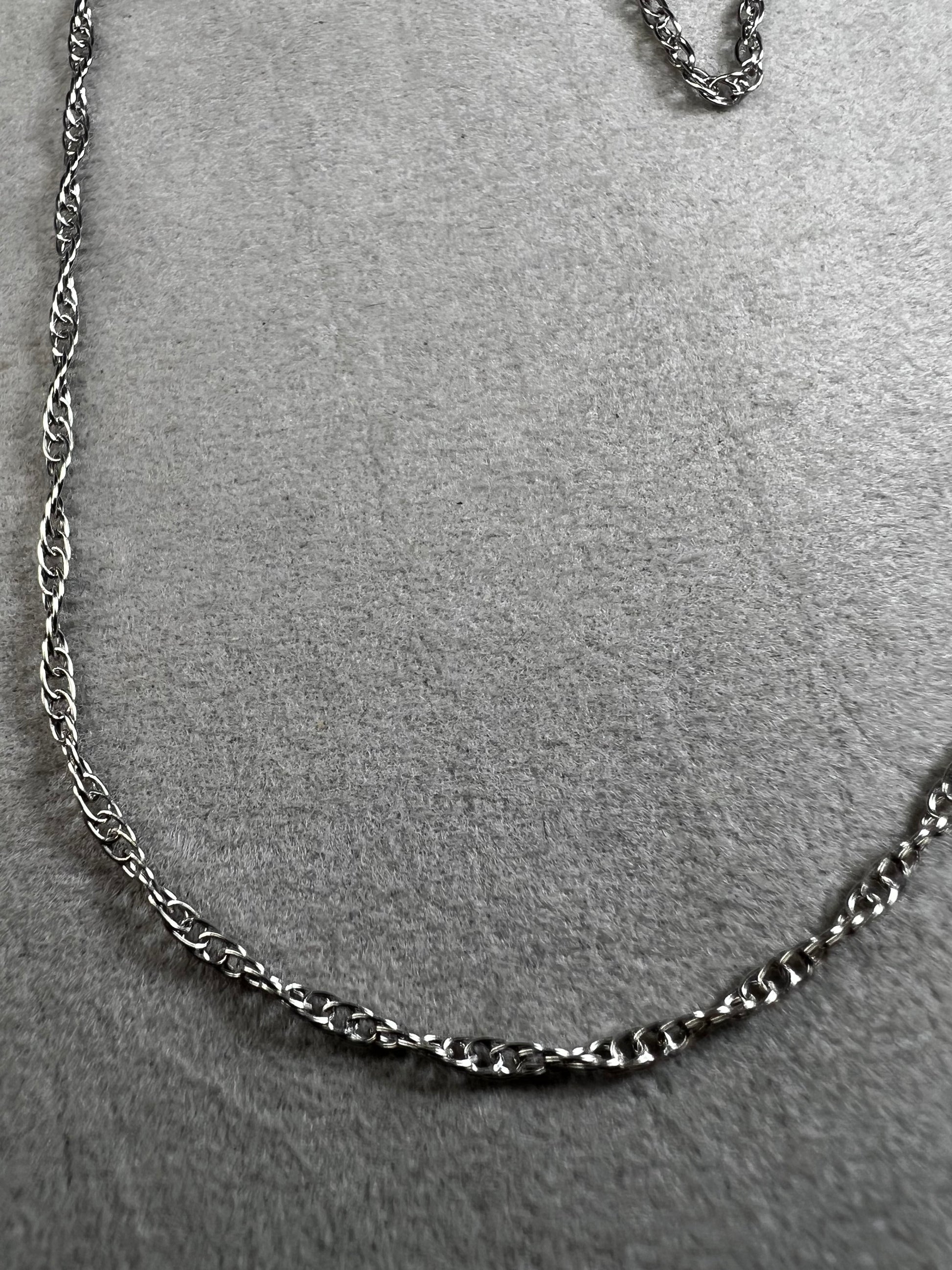 This 18" sterling silver chain offers a refined foundation for your favorite small pendants. It is perfectly balanced to complement delicate designs.