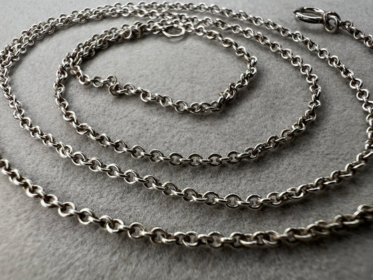 This sterling silver chain features a petite link. It is ready to be paired with a small pendant -- or wear it on its own for a touch of class.