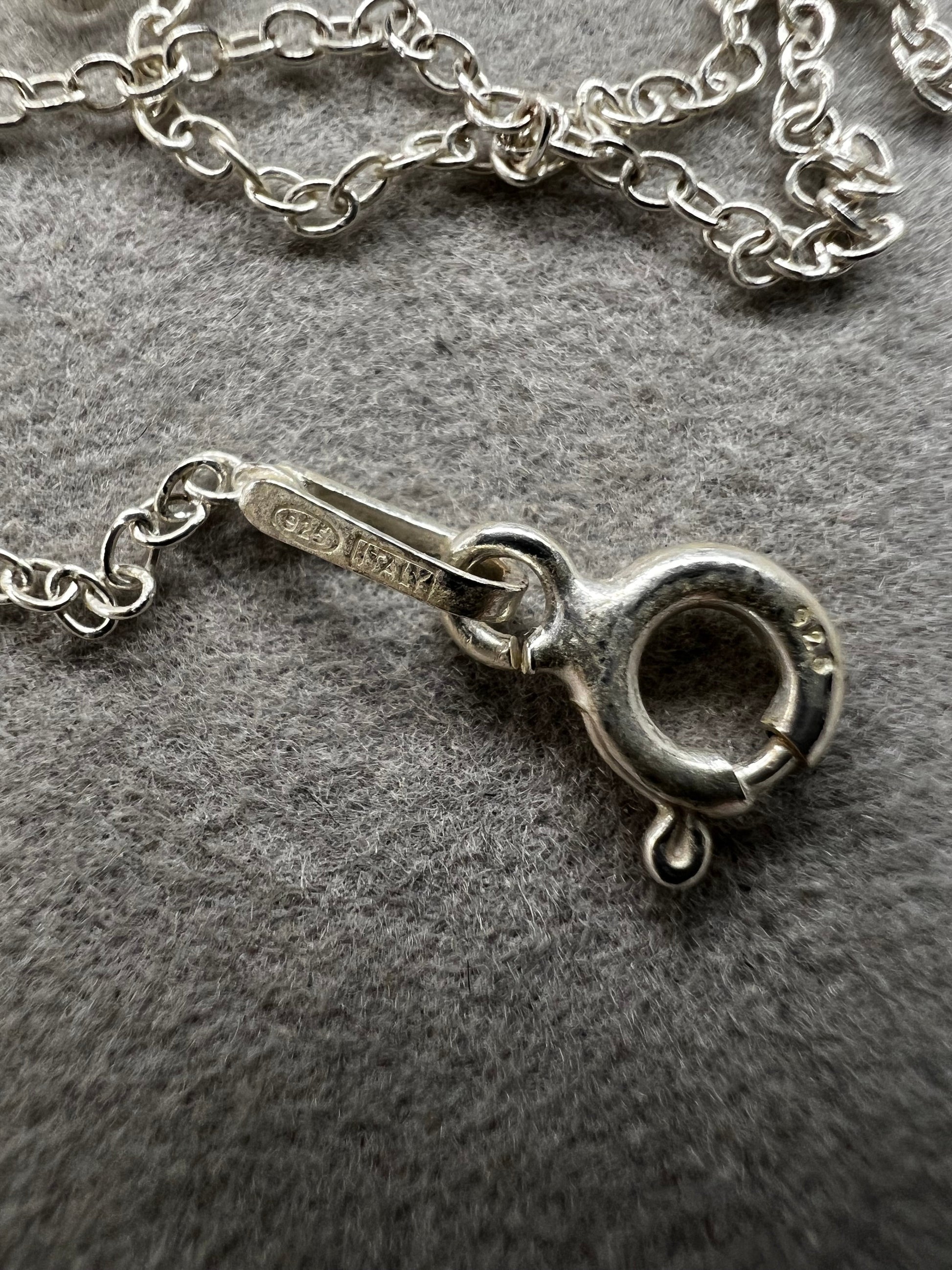 This petite sterling silver chain features a classic cable link, making it a versatile piece for your collection. It works on its own or layered with other necklaces -- or pair it with one of our small pendants.