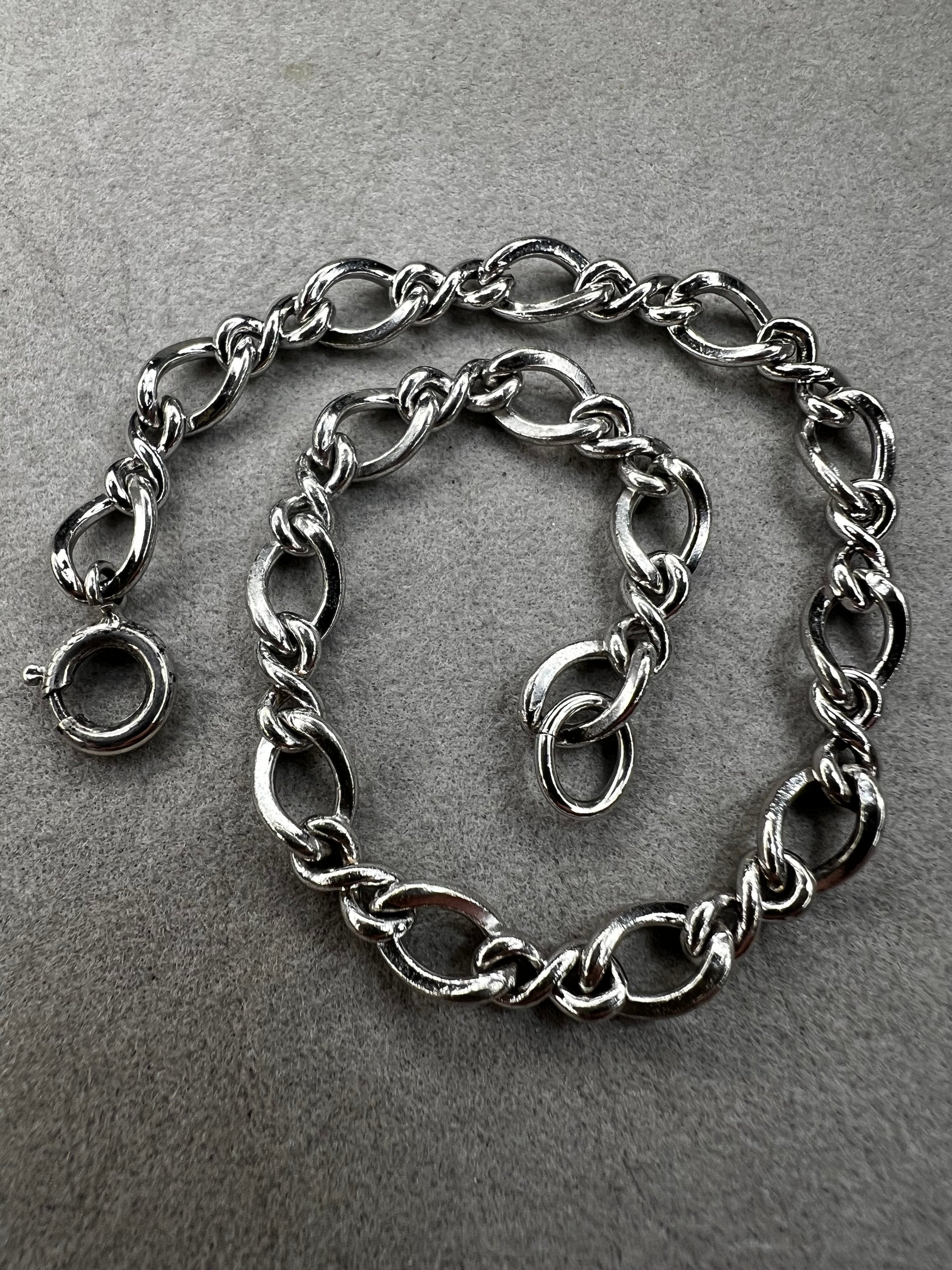 This classic sterling silver bracelet serves as the perfect foundation for personal expression, ready to be paired with a variety of charms.