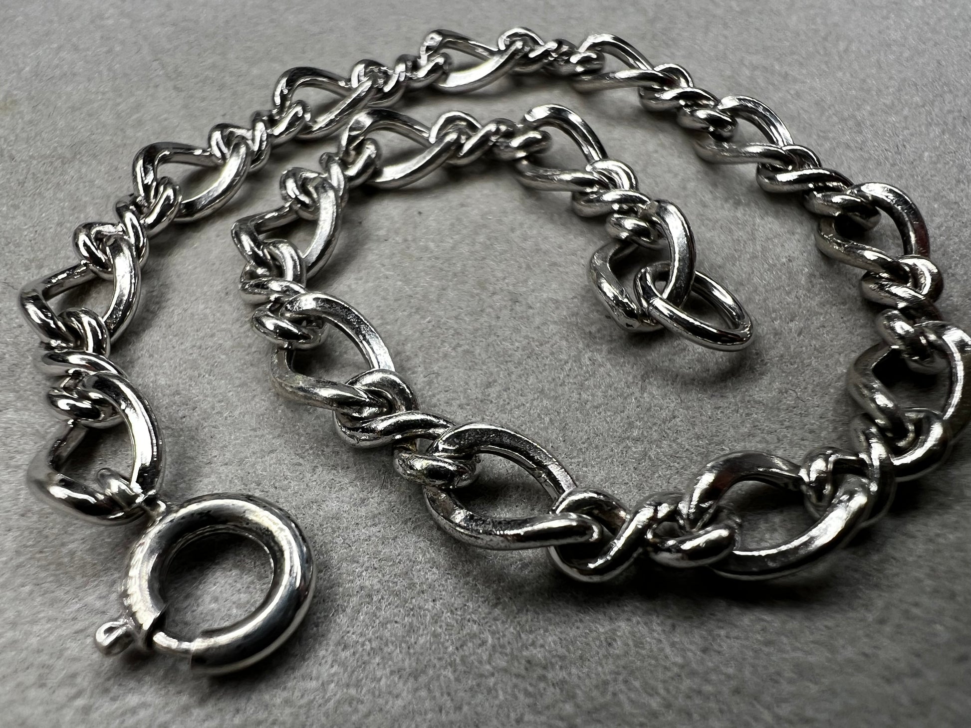 This classic sterling silver bracelet serves as the perfect foundation for personal expression, ready to be paired with a variety of charms.
