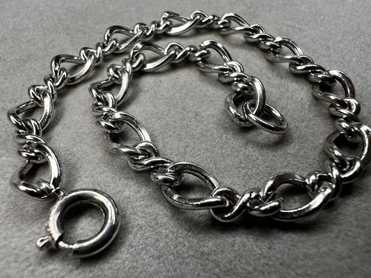 This classic sterling silver bracelet serves as the perfect foundation for personal expression, ready to be paired with a variety of charms.