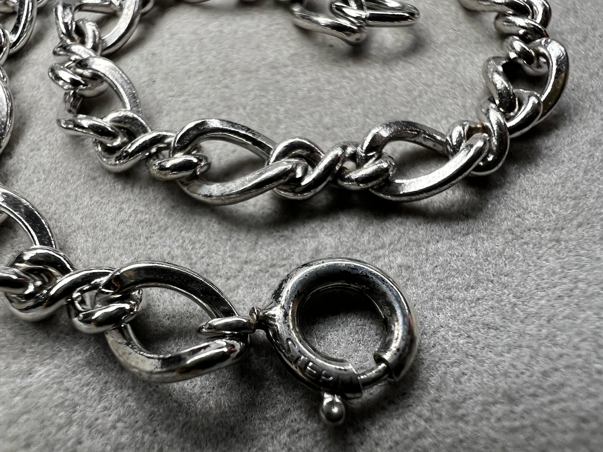 This classic sterling silver bracelet serves as the perfect foundation for personal expression, ready to be paired with a variety of charms.