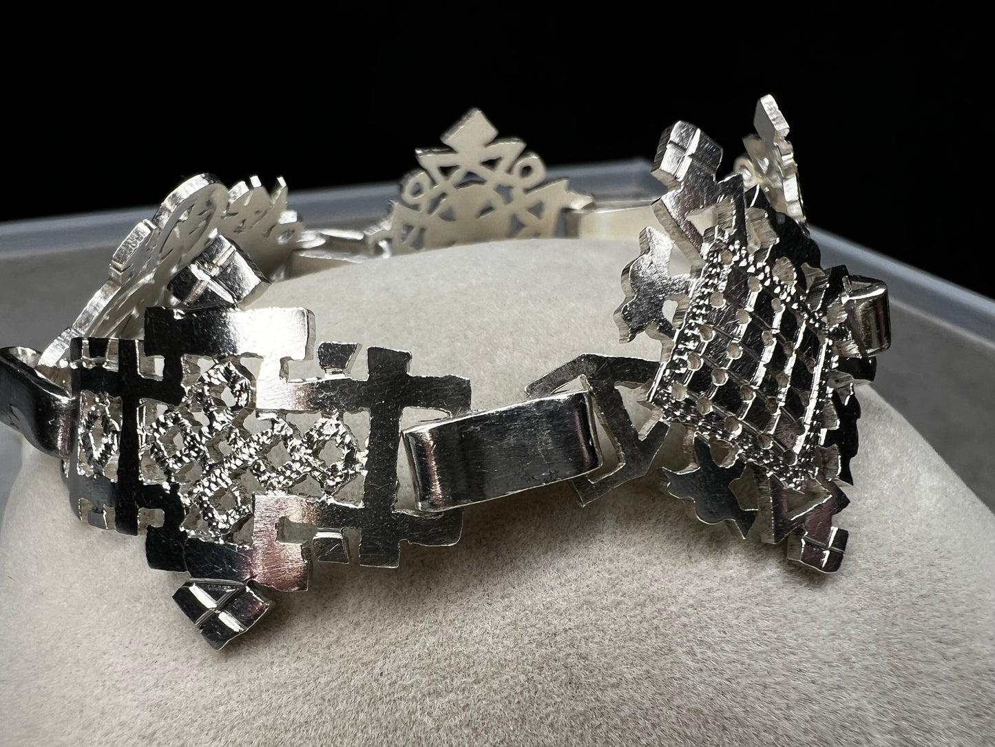 Crafted in sterling silver, this vintage bracelet features five ornate openwork panels. A timeless design that makes a striking statement.