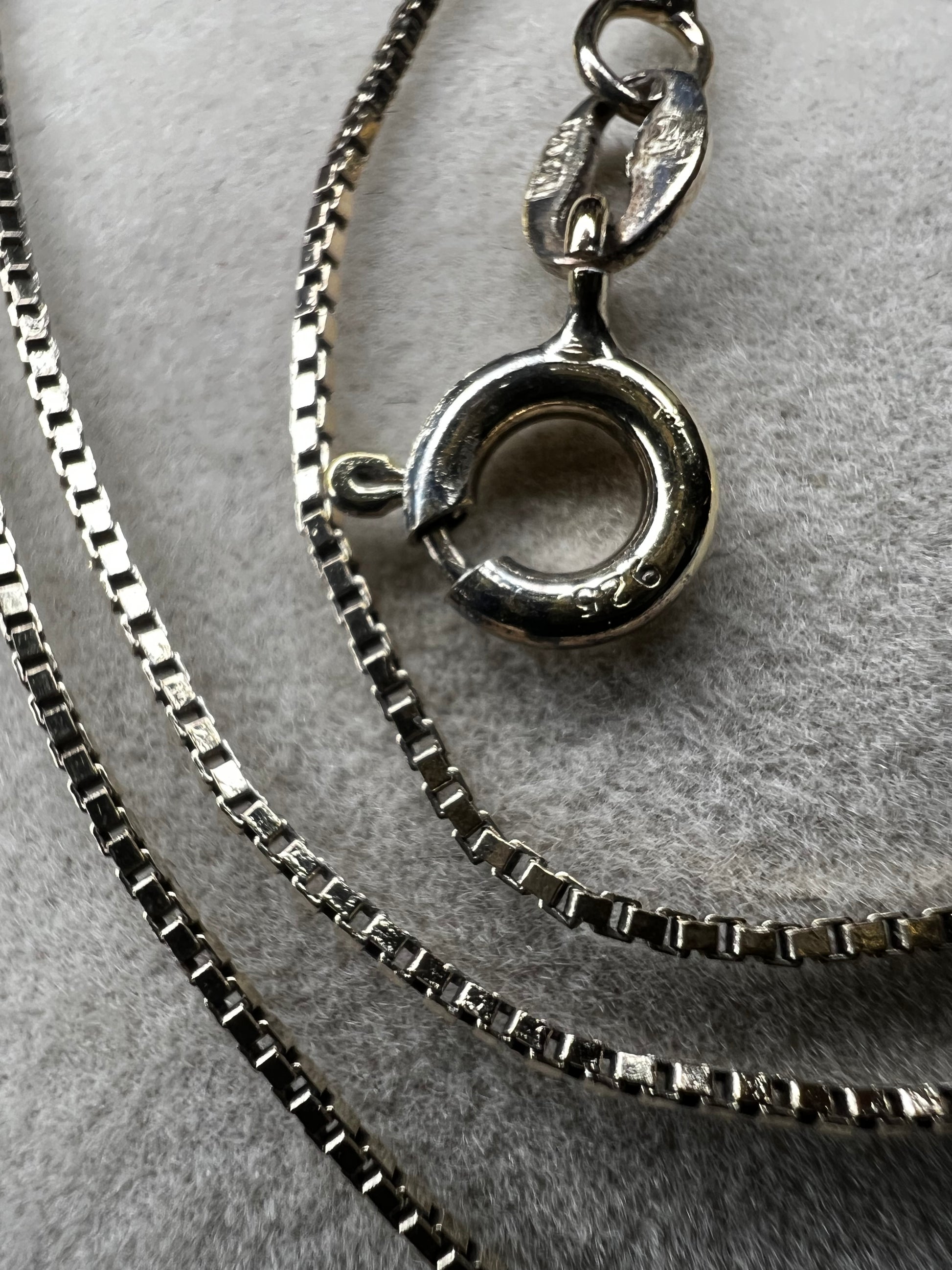 This petite chain, crafted form sterling silver with a gold finish, is built with a tough box link. Wear it alone or pair it with one of our gold-over-sterling pendants.