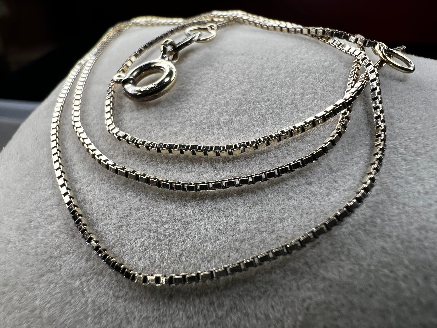 This petite chain, crafted form sterling silver with a gold finish, is built with a tough box link. Wear it alone or pair it with one of our gold-over-sterling pendants.