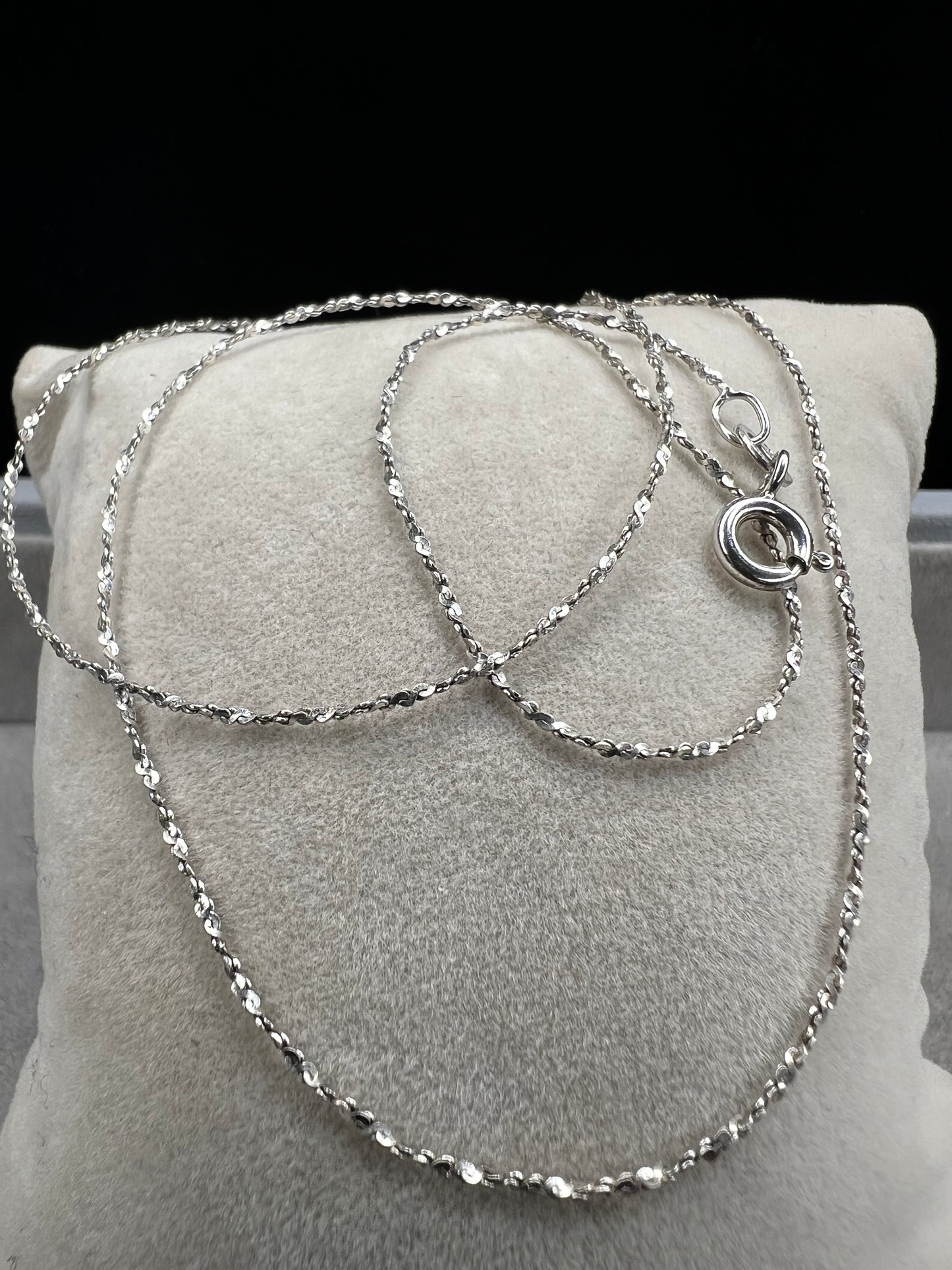 Crafted from sterling silver by Danecraft, a trusted jewelry company, this is a petite but strong chain. It can be worn solo or you can pair with one of our small sterling pendants.