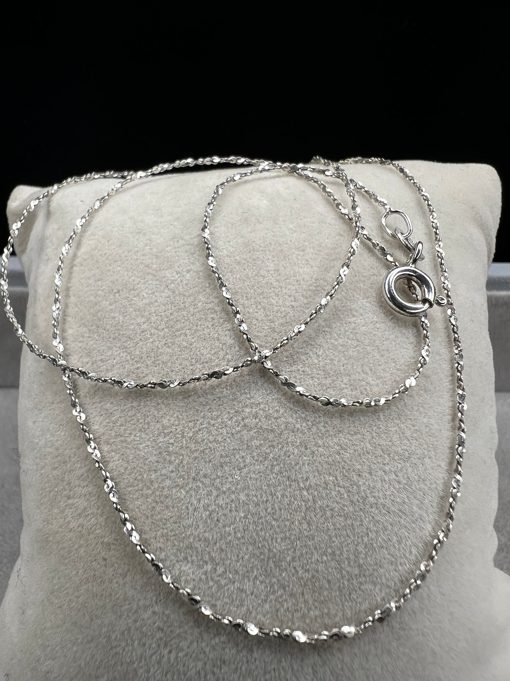 Crafted from sterling silver by Danecraft, a trusted jewelry company, this is a petite but strong chain. It can be worn solo or you can pair with one of our small sterling pendants.
