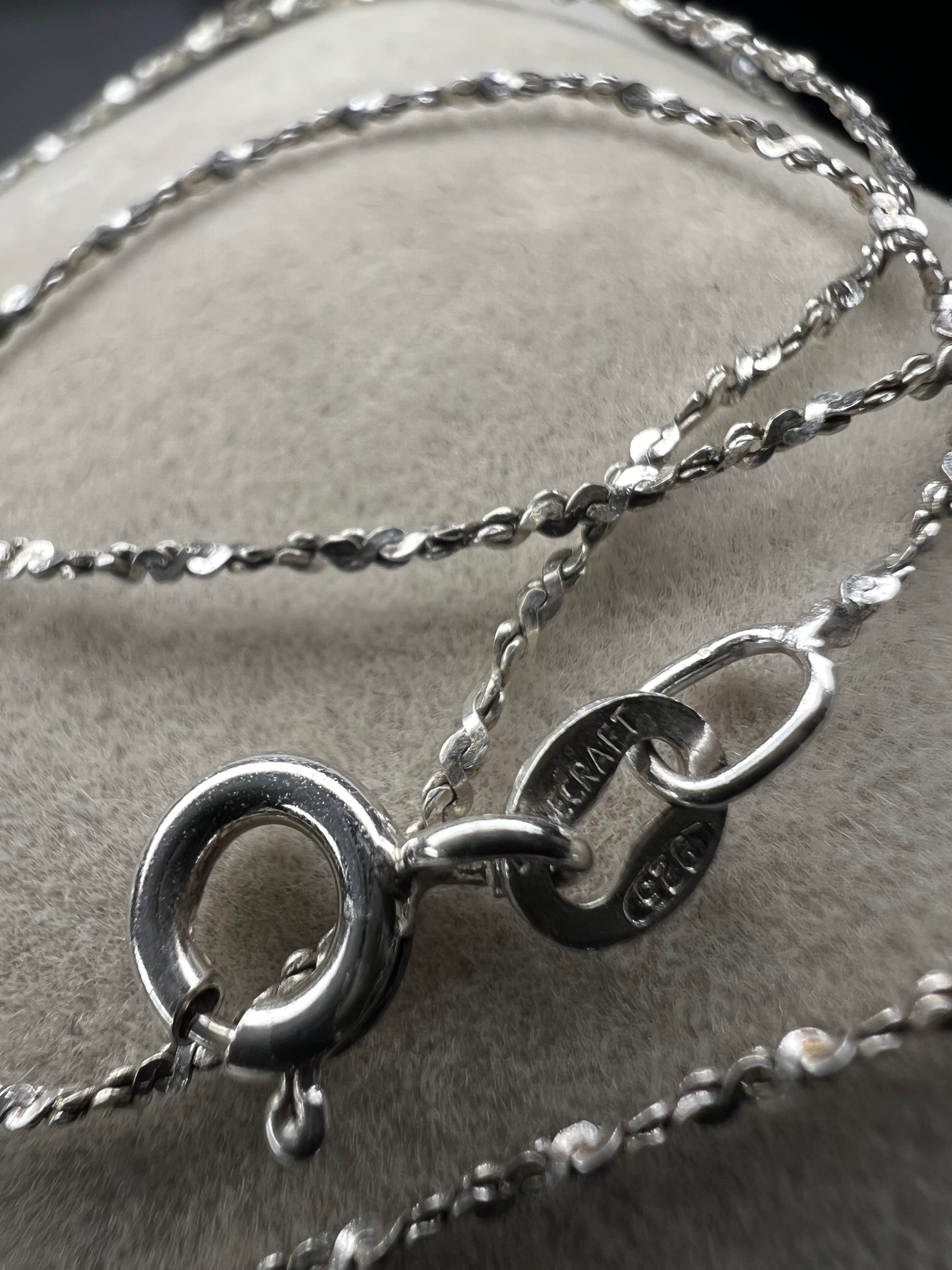 Crafted from sterling silver by Danecraft, a trusted jewelry company, this is a petite but strong chain. It can be worn solo or you can pair with one of our small sterling pendants.