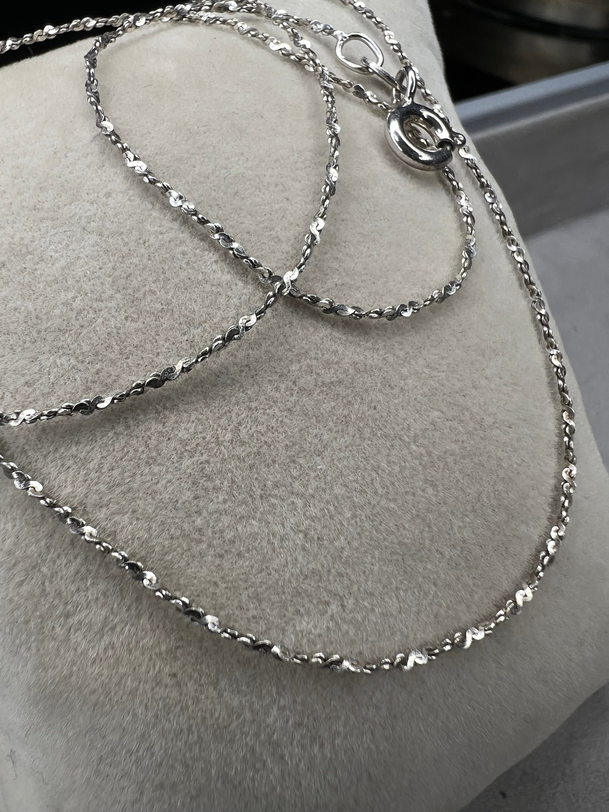Crafted from sterling silver by Danecraft, a trusted jewelry company, this is a petite but strong chain. It can be worn solo or you can pair with one of our small sterling pendants.