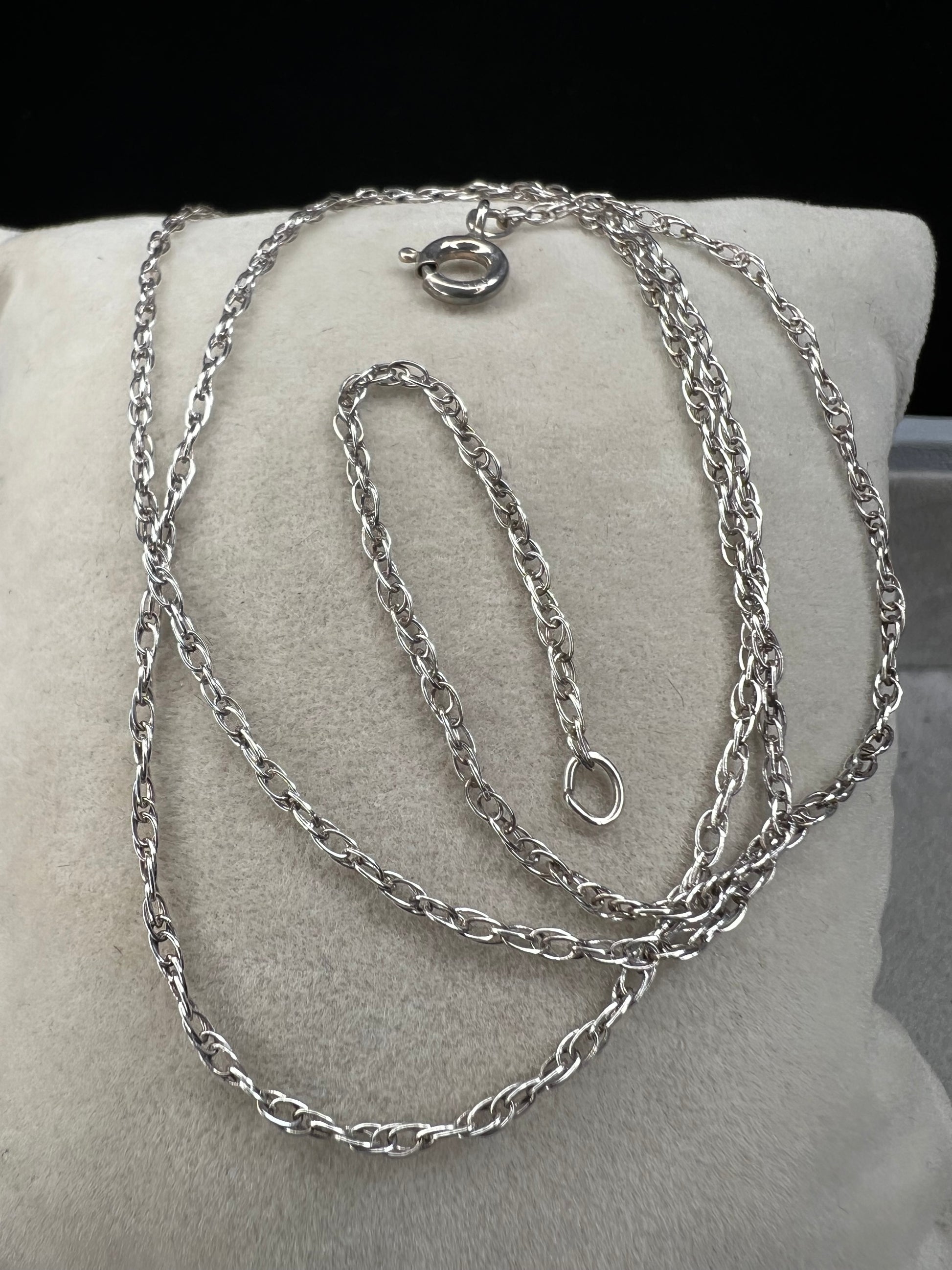 This petite chain is crafted from sterling silver and is ready to be paired with one of our small silver pendants or charms.