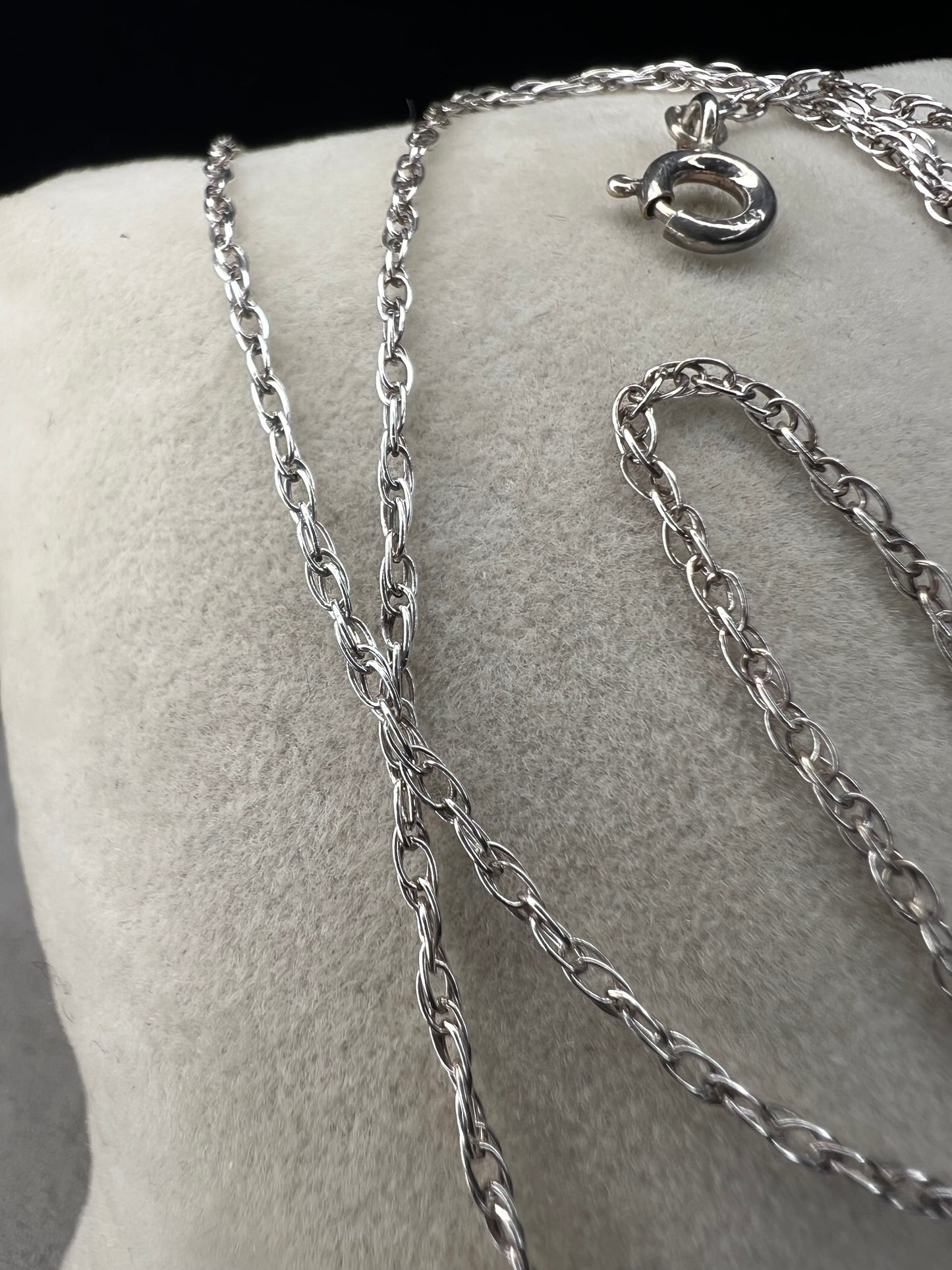 This petite chain is crafted from sterling silver and is ready to be paired with one of our small silver pendants or charms.
