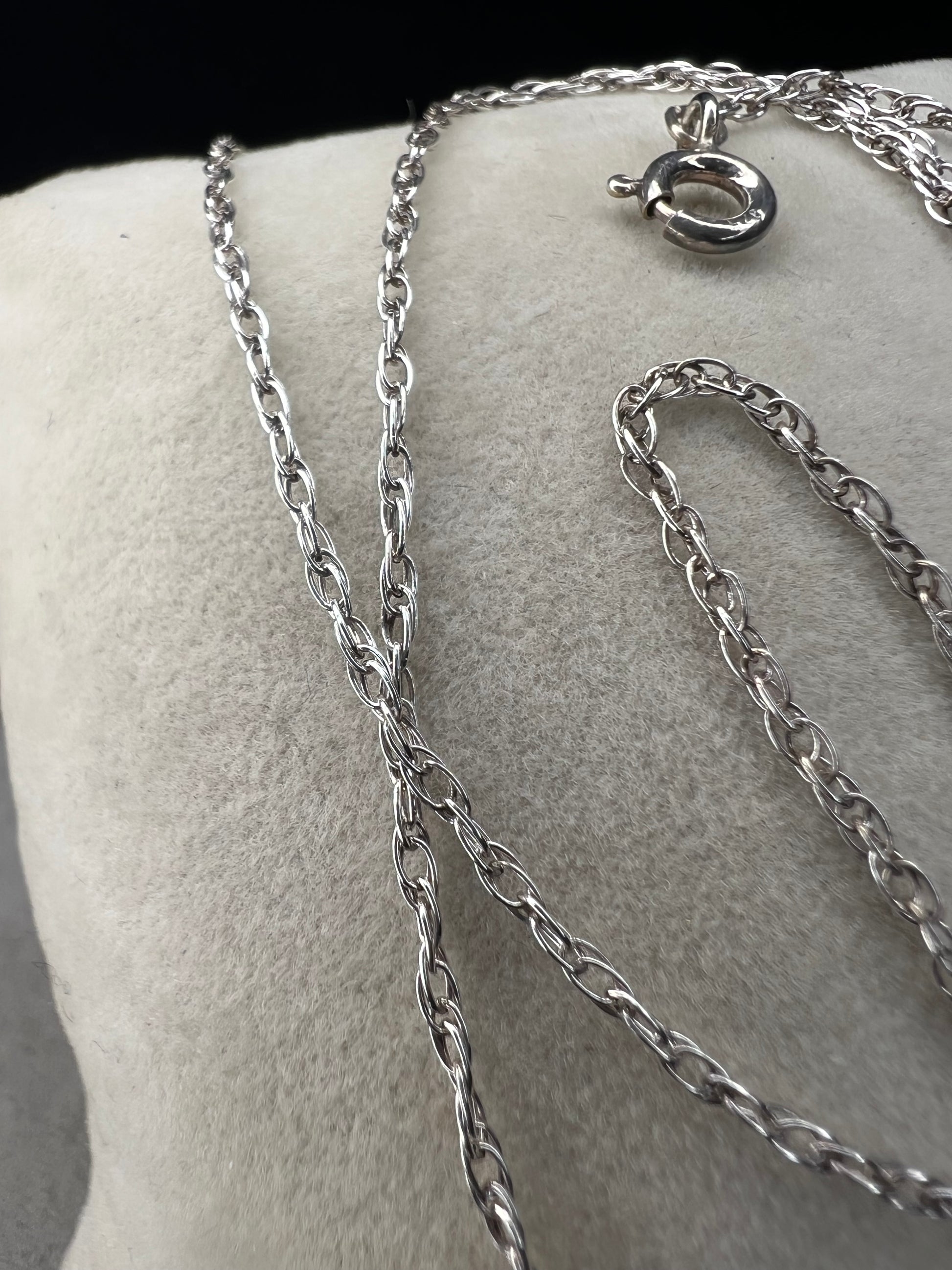 This petite chain is crafted from sterling silver and is ready to be paired with one of our small silver pendants or charms.