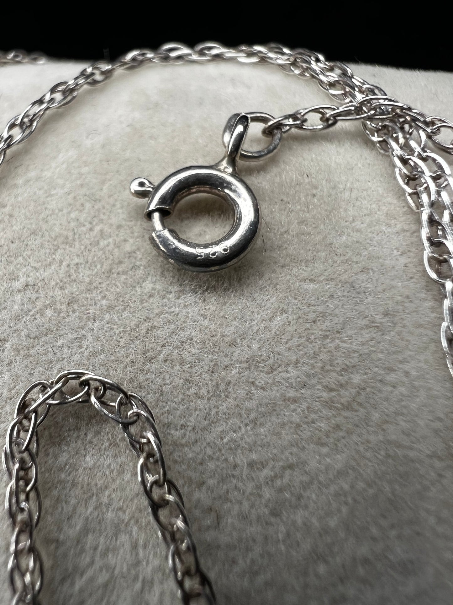 This petite chain is crafted from sterling silver and is ready to be paired with one of our small silver pendants or charms.