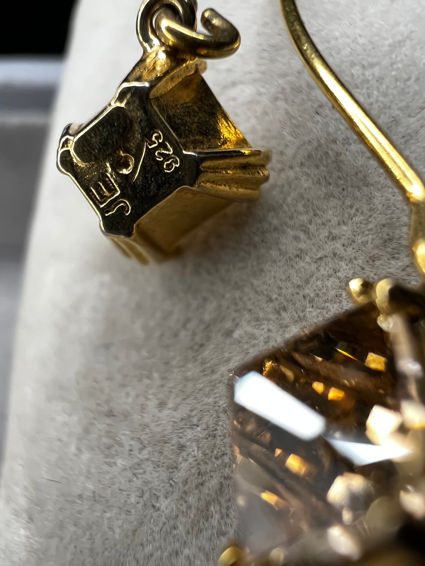 Crafted from sterling silver with a gold-wash finish, these uniquely designed earrings will be great for when you're looking for something a little different.