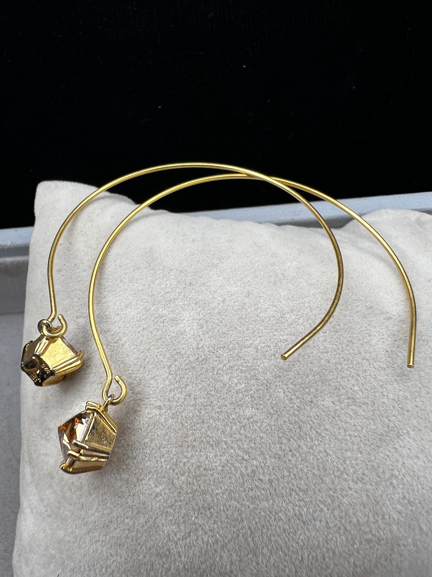 Crafted from sterling silver with a gold-wash finish, these uniquely designed earrings will be great for when you're looking for something a little different.